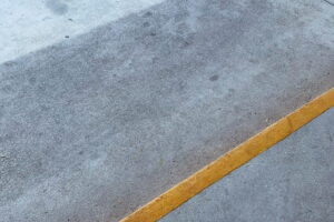 gray pavement, asphalt sealcoat, asphalt sealcoating, sealcoating asphalt